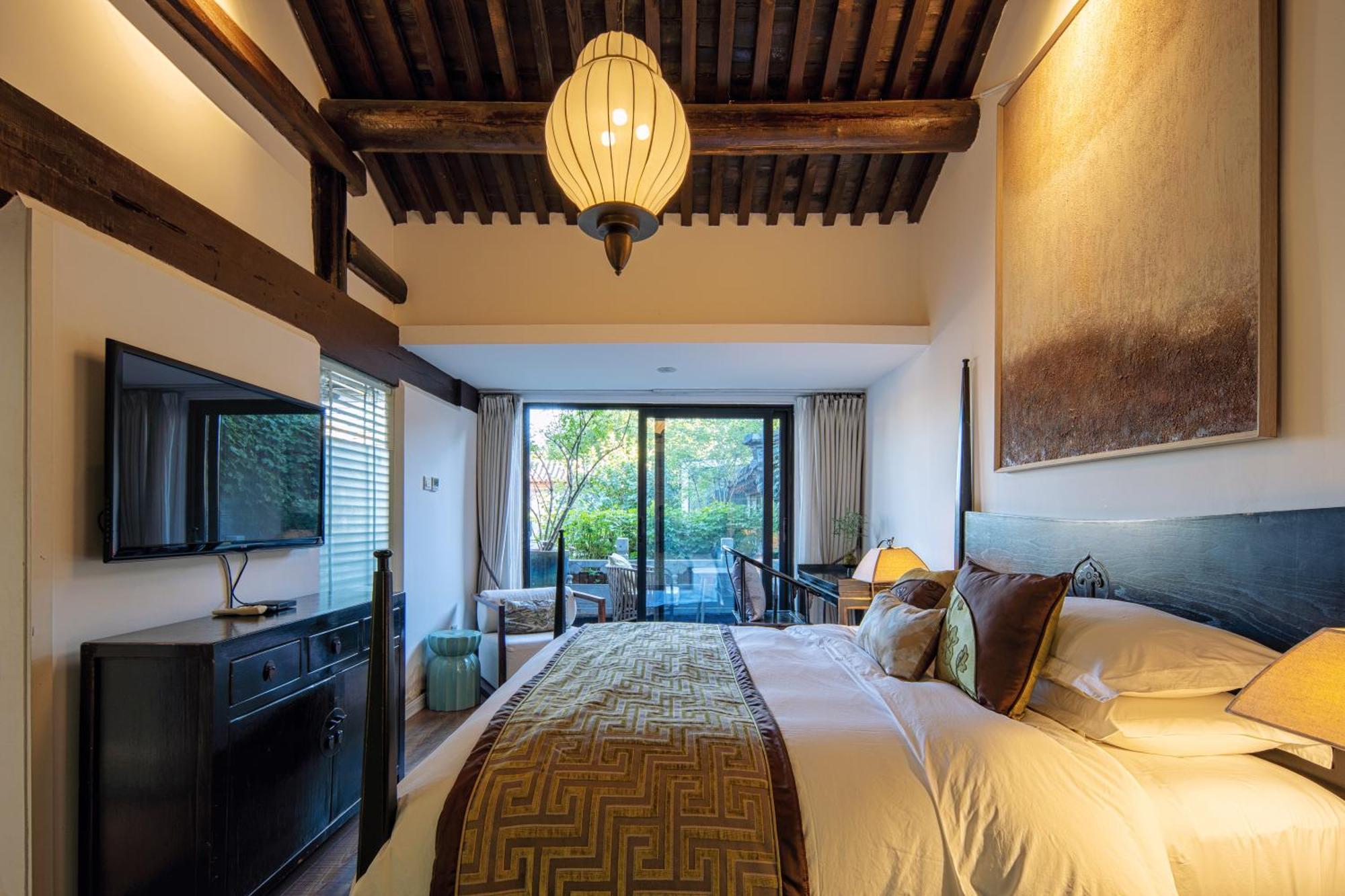 Le Zai Nan Luo Gu Xiang Wang Fu Jing Forbidden Courtyard Hotel&free Laundry Service&free Coffee &paid Dumpling Experience Service